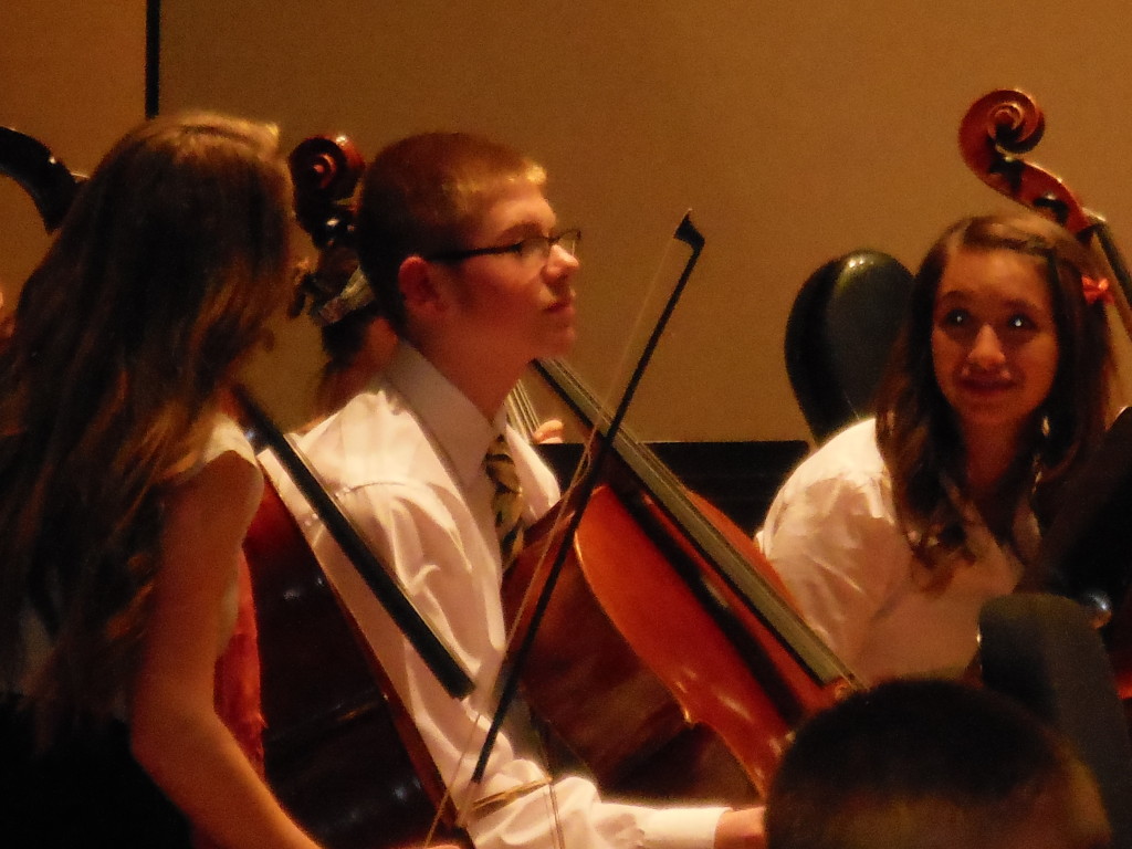 Hunter playing his cello