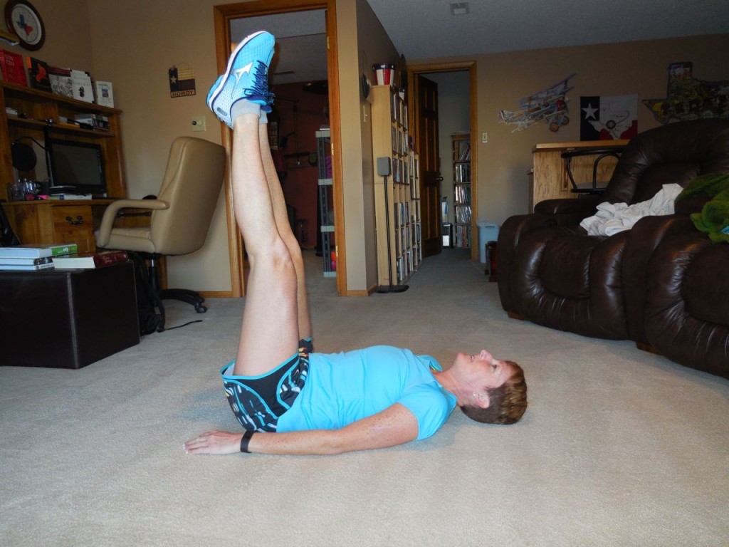 lay on back - legs up - point toes